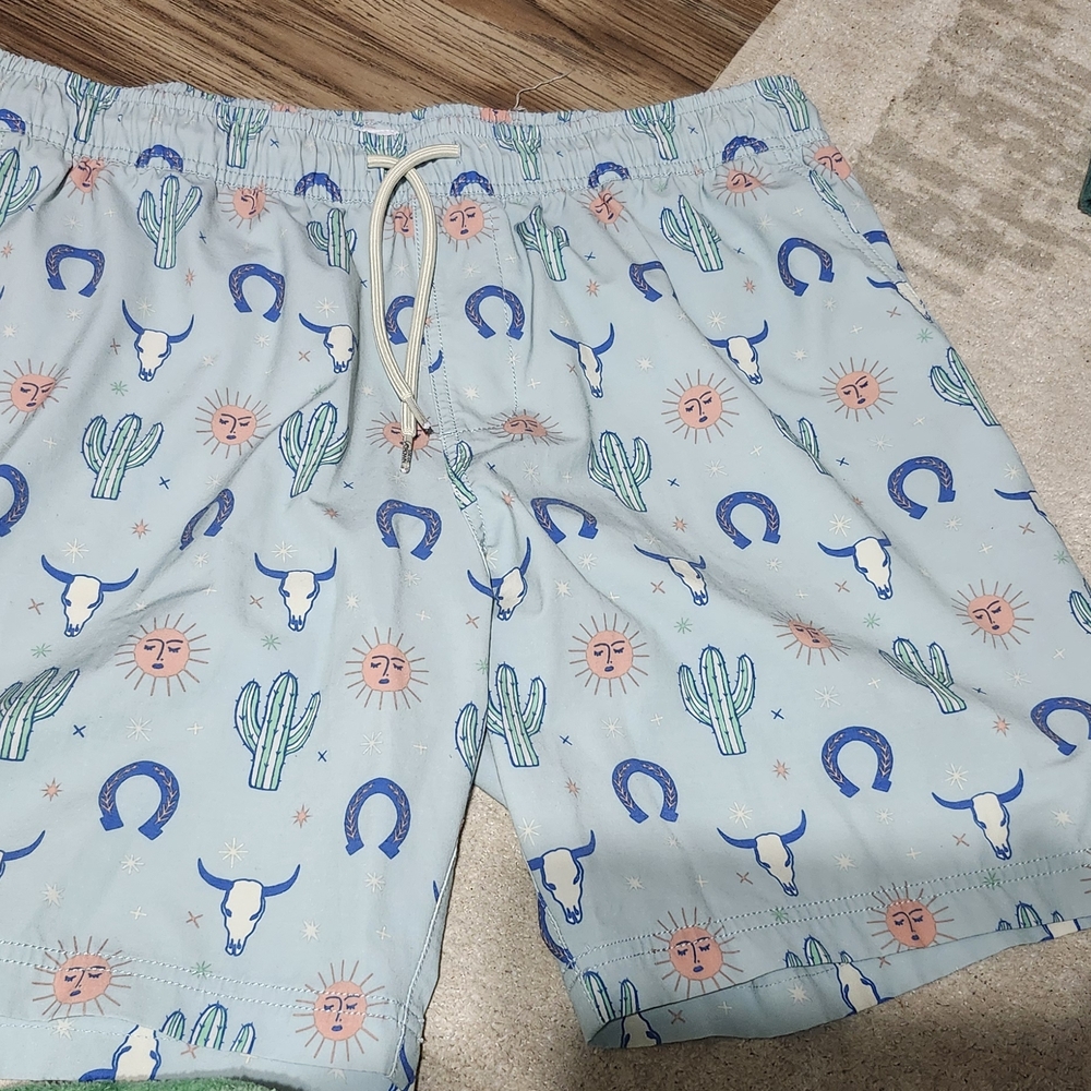 Orange and Blue Swim Trunks with Playful Pattern